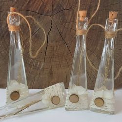 Botella vidrio con flor seca Collage