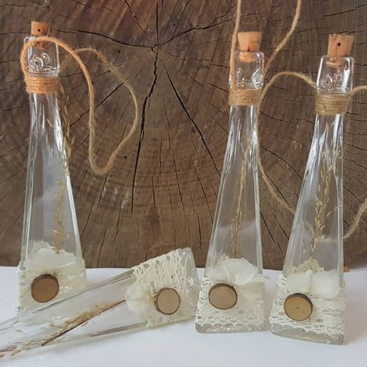 Botella vidrio con flor seca Collage