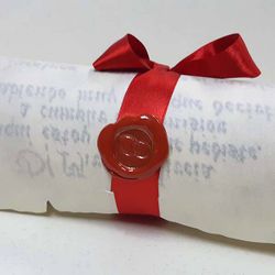 Pergamino escrito a mano con fotografía